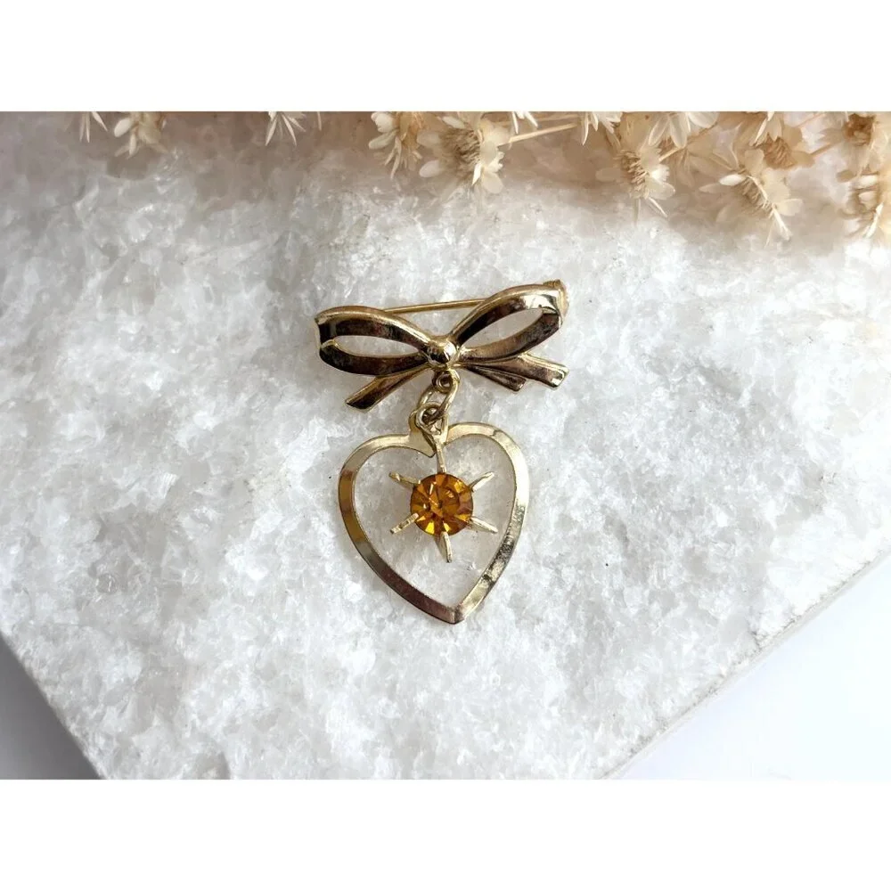 Gold Toned Matte Ribboned Bow Heart Shaped Orange Rhinestoned  Brooch